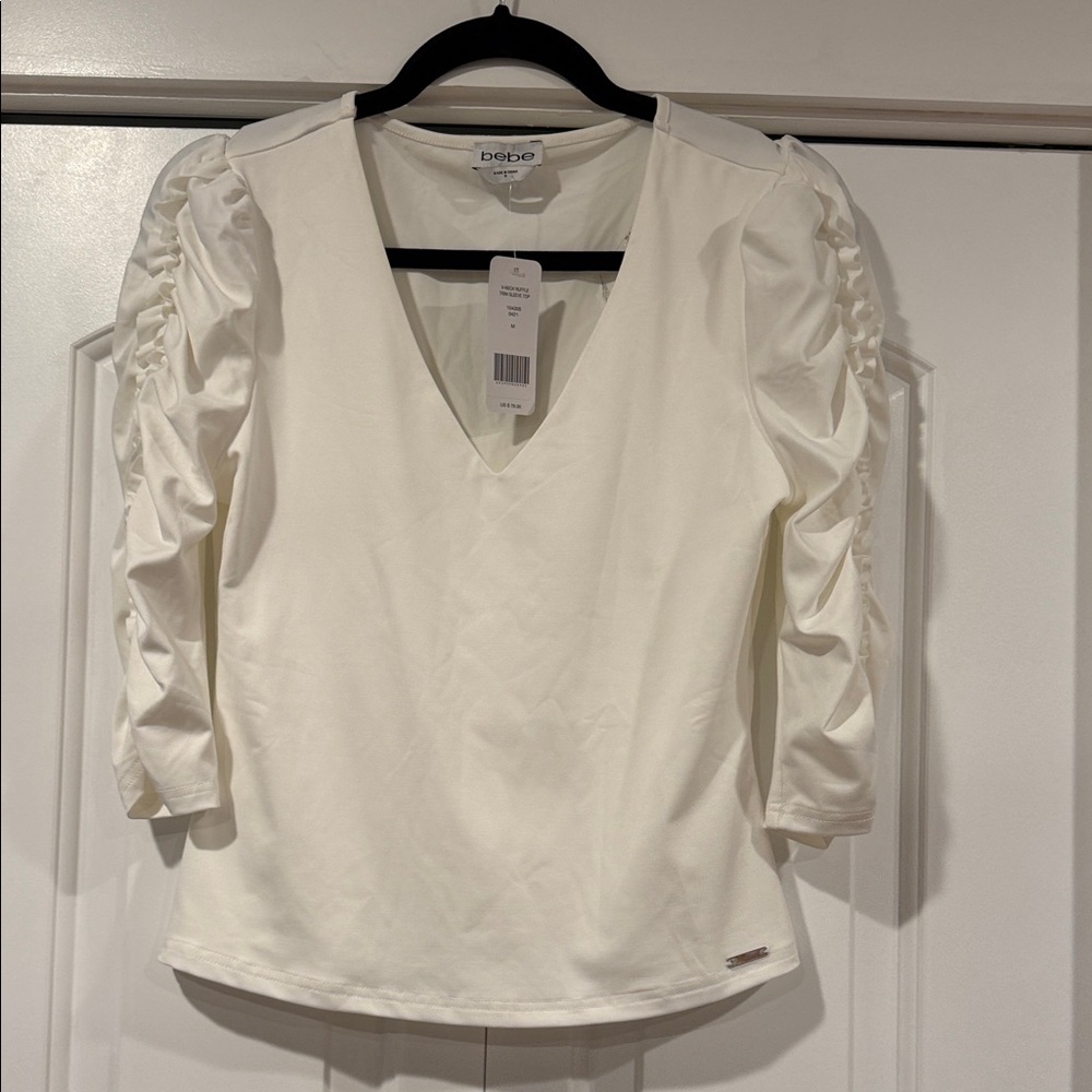 bebe Ivory V-Neck Ruched Sleeve Blouse small NWT‎